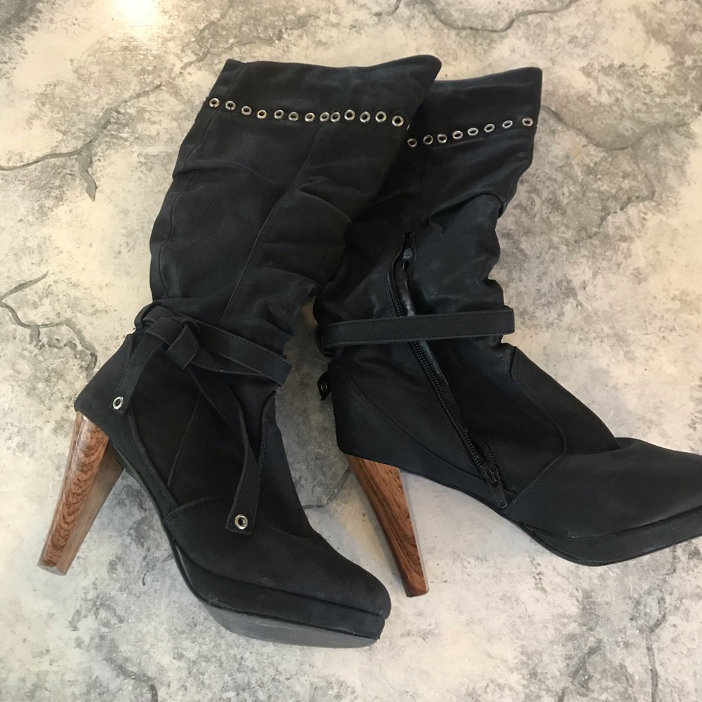 Tall black high heel boots